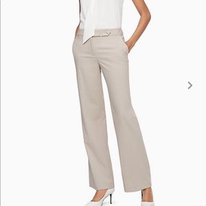 Calvin Klein cream colored dress pants.